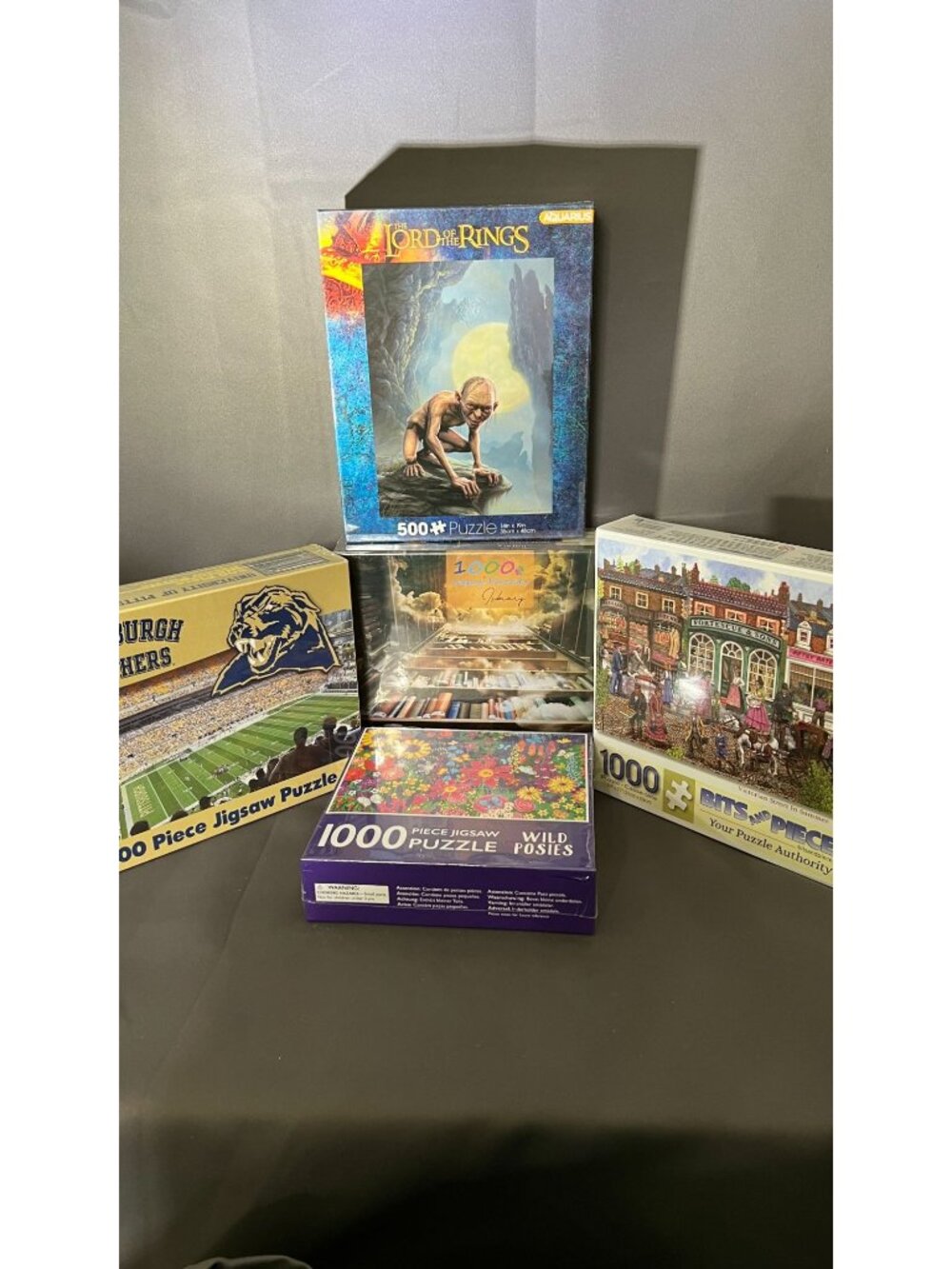 Five Assorted New Puzzle Sets Featuring Unique Artwork & Themes